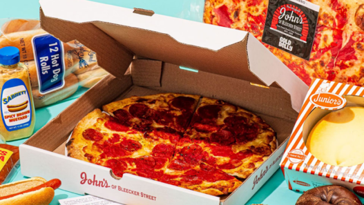 Gourmet monthly pizza subscription box featuring an assortment of artisanal pizzas in a stylish branded cardboard box.