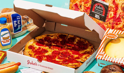 Gourmet monthly pizza subscription box featuring an assortment of artisanal pizzas in a stylish branded cardboard box.