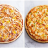 Homemade buffalo chicken pizza topped with shredded chicken coated in hot sauce, melted mozzarella, and ranch drizzle.