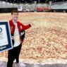Aerial view of Pizza Hut’s world-record-breaking giant pizza, officially recognized by Guinness World Records as the largest pizza ever made.