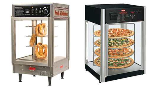 Commercial pizza kitchen workspace showcasing dough mixer, pizza oven, prep tables, and ingredient shelving—essential pizzeria supplies.