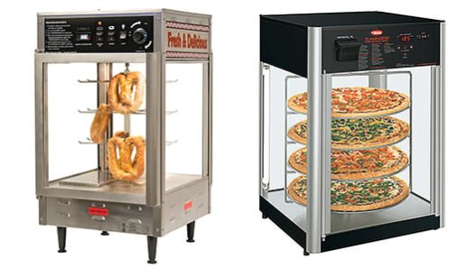 Commercial pizza kitchen workspace showcasing dough mixer, pizza oven, prep tables, and ingredient shelving—essential pizzeria supplies.