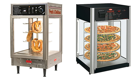 Commercial pizza kitchen workspace showcasing dough mixer, pizza oven, prep tables, and ingredient shelving—essential pizzeria supplies.