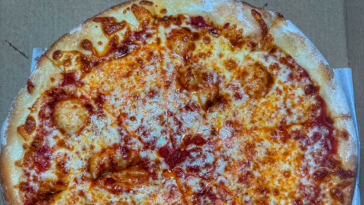 Cheese-topped New York–style pizza from Angeli’s Pizzeria in Baltimore, winner of Maryland’s best slice honor.
