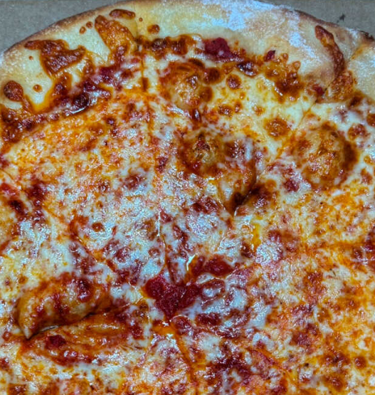 Cheese-topped New York–style pizza from Angeli’s Pizzeria in Baltimore, winner of Maryland’s best slice honor.