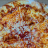 Cheese-topped New York–style pizza from Angeli’s Pizzeria in Baltimore, winner of Maryland’s best slice honor.