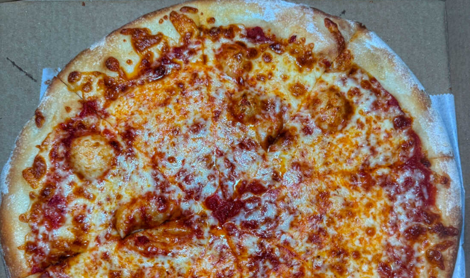 Cheese-topped New York–style pizza from Angeli’s Pizzeria in Baltimore, winner of Maryland’s best slice honor.