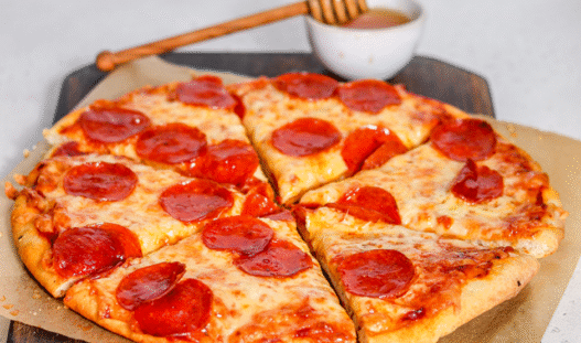 Hot Honey Pepperoni Pizza with curled cup-and-char pepperoni and a spicy honey drizzle on golden crust
