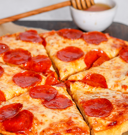 Hot Honey Pepperoni Pizza with curled cup-and-char pepperoni and a spicy honey drizzle on golden crust