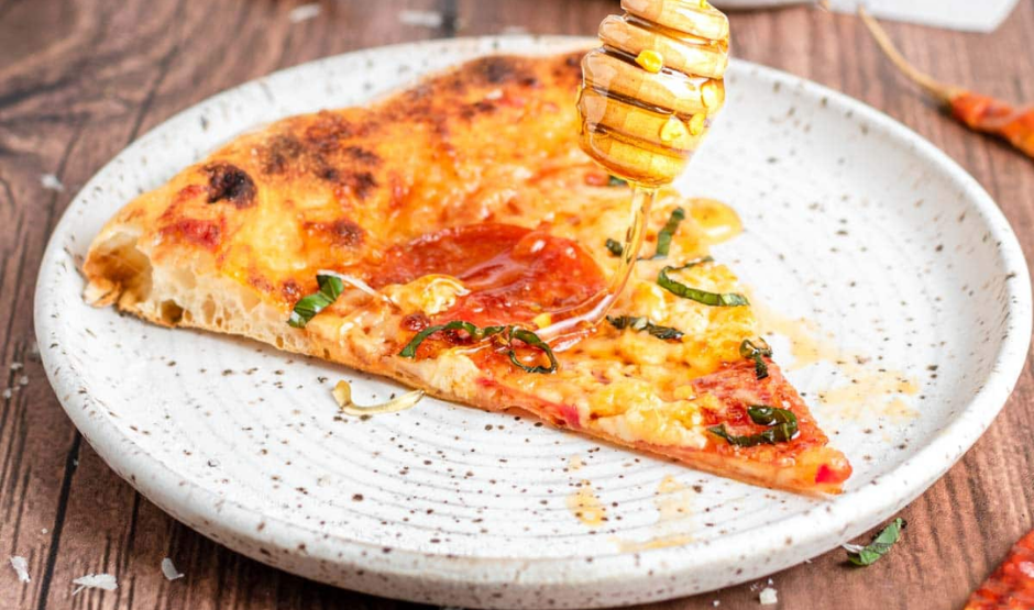 Hot Honey Pepperoni Pizza with curled cup-and-char pepperoni and a spicy honey drizzle on golden crust