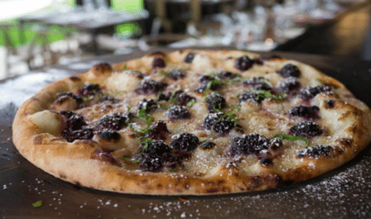 Gaucho Heat Pizza with chimichurri steak and LA-inspired spicy toppings