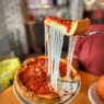 Lou Malnati’s storefront in Washington, D.C. featuring iconic deep-dish branding